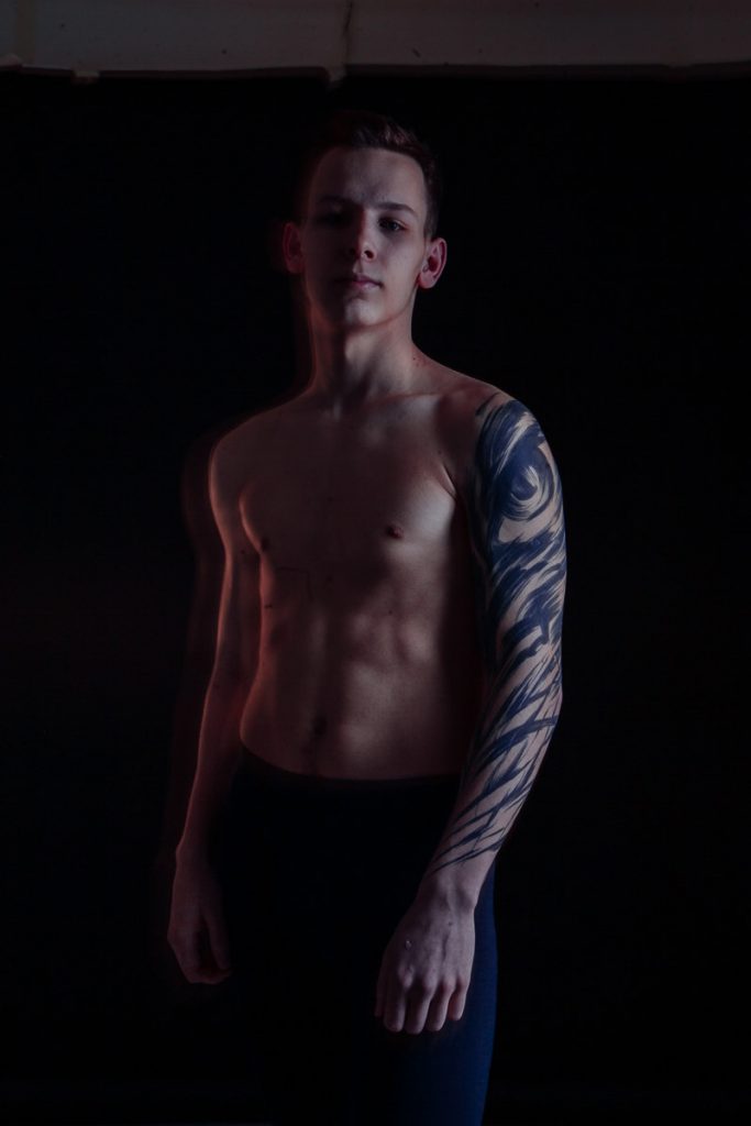 Arm abstract blackwork tattoo by Arkhip Znakov on a sexy man.